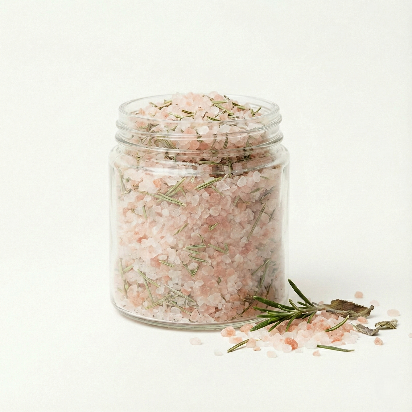 Original Skinn Rosemary and Clary Sage bath salt in 300g clear glass jar.